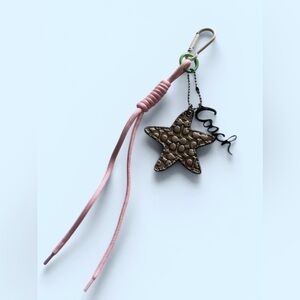 Coach Metallic Star Keychain with Pink Cord